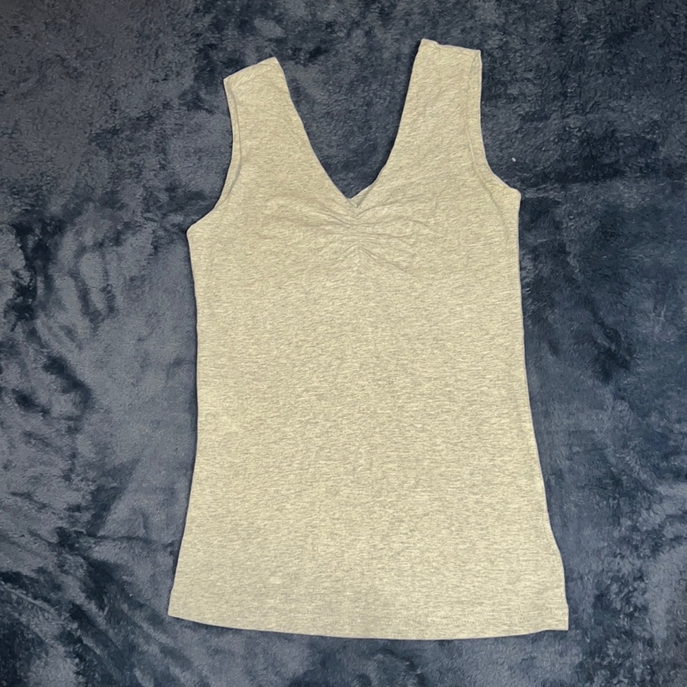 Grey tank top.